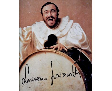 PAVAROTTI LUCIANO: (1935-2007) Italian tenor. Signed colour 8 x 10 photograph of Pavarotti in a head and shoulders pose, in c