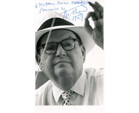 MILHAUD DARIUS: (1892-1974) French Composer. A good signed and inscribed postcard photograph, the image showing Milhaud in a 
