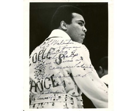 ALI MUHAMMAD: (1942-2016) American boxer, World Heavyweight Champion. A good signed and inscribed 8 x 10 photograph of Ali st