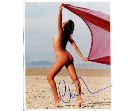 THERON CHARLIZE: (1975- ) South African Actress, Academy Award winner. Signed colour 8 x 10 photograph, a glamorous image of 