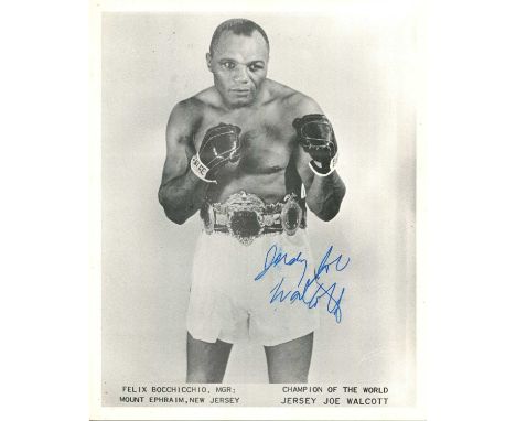 WALCOTT JERSEY JOE: (1914-1994) American boxer, World Heavyweight Champion 1951-52. Signed 8 x 10 photograph of Walcott stand