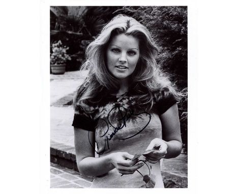 PRESLEY PRISCILLA: (1945- ) American actress, the wife of Elvis Presley from 1967-73 and the subject of the American biograph