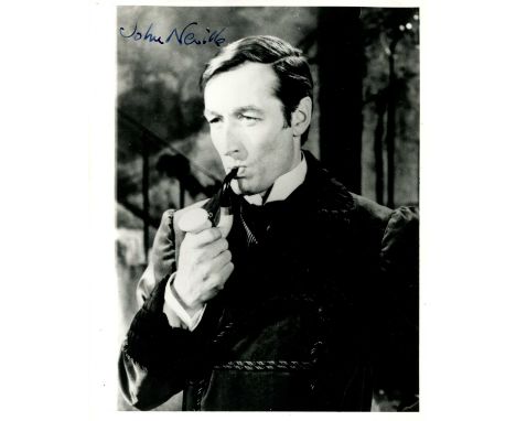 [SHERLOCK HOLMES]: NEVILLE JOHN (1925-2011) English actor. Signed 8 x 10 photograph of Neville in a half-length pose, smoking