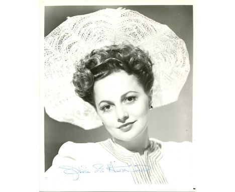 DE HAVILLAND OLIVIA: (1916-2020) British actress, Academy Award winner. Signed 8 x 10 photograph of De Havilland in a head an