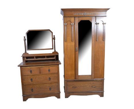 1930s oak single robe, with bevelled glass mirror door, drawer base, width 102cm, with a matching dressing chest, fitted beve