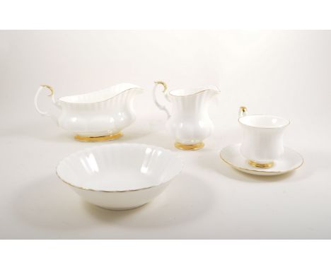 Royal Albert Val D'or service, including eight dessert plates, nine side plates, seven cereal bowls, ten tea cups, gravy boat