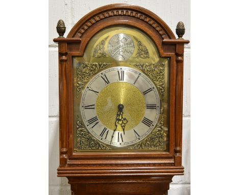 Modern walnut longcase clock, domed hood, glazed door, splayed bracket feet, 9.5" arched brass dial, with cast spandrels, sil