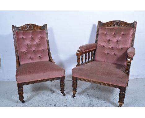 Victorian oak gentlemans armchair, stylised flower and leaf pediment, galleried arms, turned and ringed legs, button dralon u