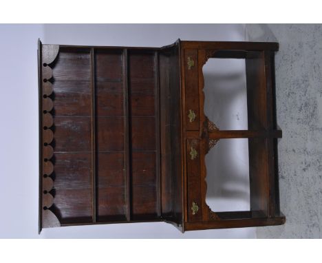 Old oak dresser, with a matched three shelf Delft rack, base with two drawers over a potboard, W140cm, H177cm.