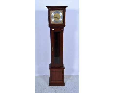 A Metamec reproduction grandmother longcase clock, roman numeral chapter ring and brass spandrels to each corner of dial, mah