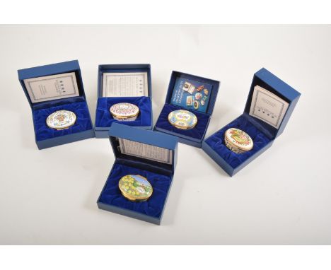 Twenty three Halcyon Days enamel Year boxes.