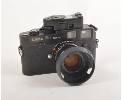Leica camera M4-2 with black body, s/n 1469072 with Summicron N 1:2/50mm lens (lens has original box), and meter MR s/n 43896