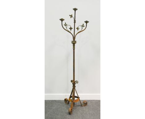 Gothic style wrought iron standard three branch candelabra, height 167cm.