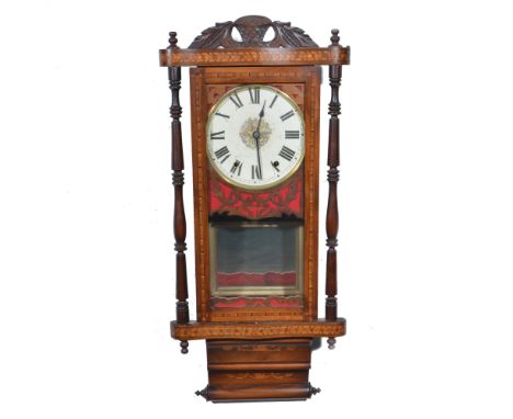 American wall clock, marquetry and Tunbridge decoration, door flanked by turned spindles, movement striking on a bell, 90cm.