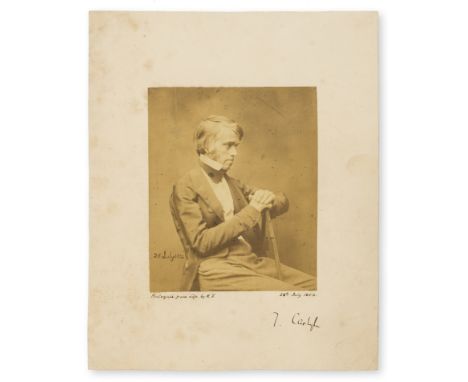 Tait (Robert Scott) Portrait of Thomas Carlyle, half-length, seated, albumen print, 128 x 102 mm. (5 x 4 in.), on a contempor