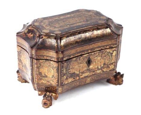 A Chinese Canton black lacquer two-canister tea caddy of shaped rectangular form with gilt decoration, 20cms wide.