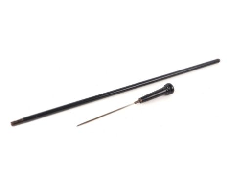 An ebonised swordstick with 22cms stiletto blade, 90cms long.