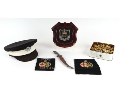 A St John's Ambulance cap; together with a quantity of brass military buttons; two W.C.S.F.C. cloth badges; a framed cloth ba