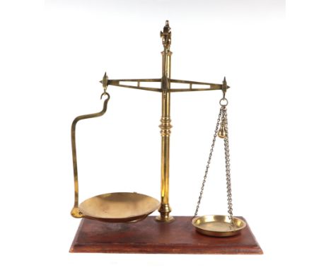 A set of Victorian style brass shop scales, 50cms wide.