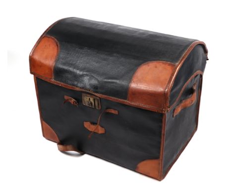 A canvas and leather covered wickerwork dome top travel trunk, 78cms wide.