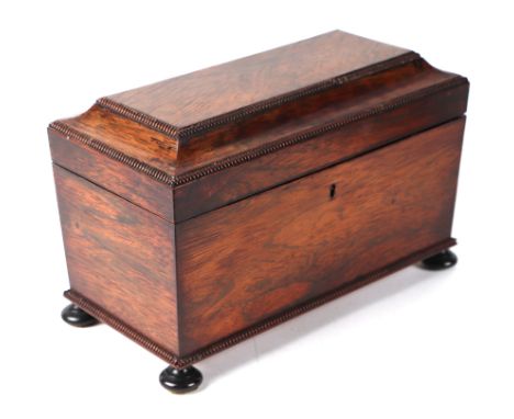 A William IV rosewood sarcophagus two-division tea caddy, 31cms wide.Condition ReportThe mixing bowl is associated.
