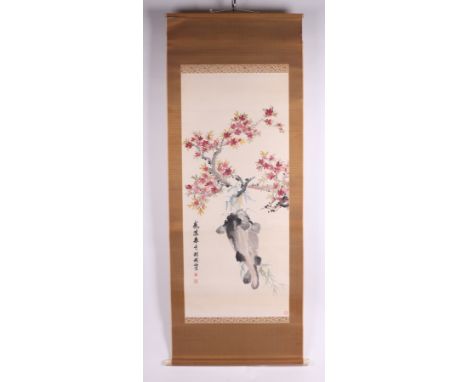 A Chinese watercolour scroll painting depicting a carp, signed, 125 by 54cms.