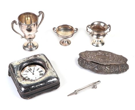 A small collection of silver items to include a two-handled silver trophy, London 1931 with presentation inscription; two sim