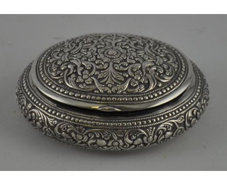 A 19th century engraved Persian silver snuff box of oval form c.1890, 8 x 6.5cm, 70grams