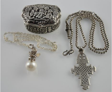 A Thomas Sabo silver and faux pearl angel pendant on fine link chain, together with a Dutch style white metal pill box and a 