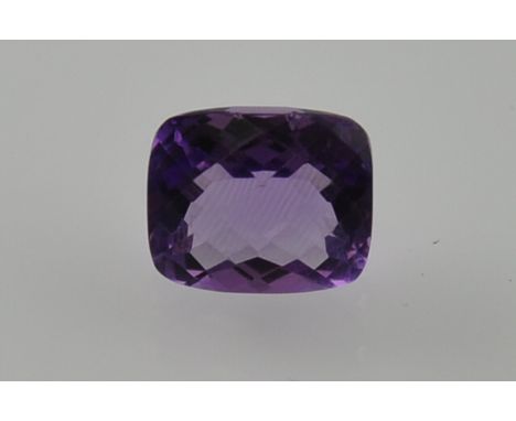 An unmounted rectangular faceted amethyst