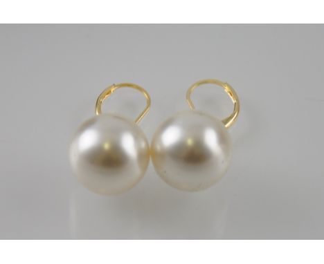 A pair of 14ct gold faux pearl earrings