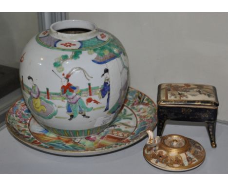 An early 20th Century Satsuma footed jar together with a squat teapot, a Canton famille rose plate and a ginger jar (4)