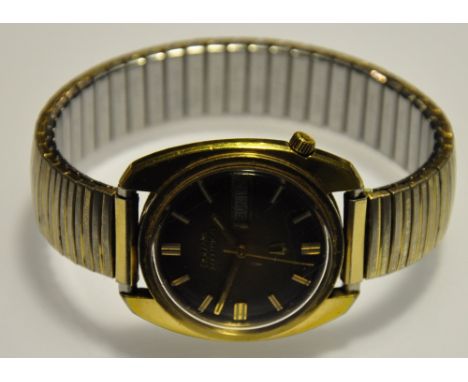 A gentleman's vintage Bulova Accutron gold plated and stainless steel wristwatch circa 1977, the two tone dial with baton num