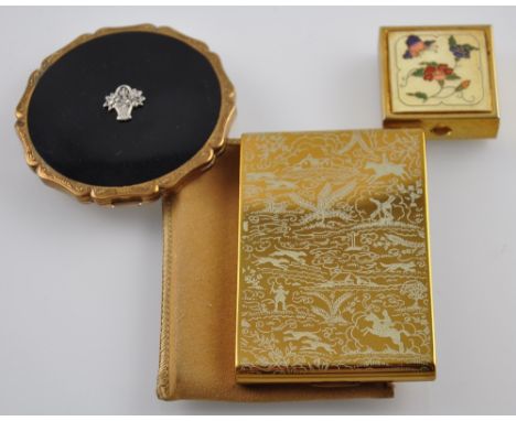 A 1950's vogue compact, together with a Stratton compact and one other