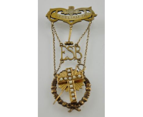 A Scottish silver gilt Communion brooch, the seed pearl encrusted cross set within a thistle wreath. Hallmarked Edinburgh 194