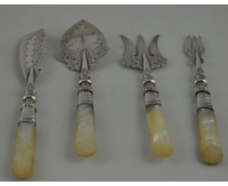 A set of Edwardian silver servers for jam, butter, pickle and sardines, all with carved mother of pearl handles. Hallmarked B