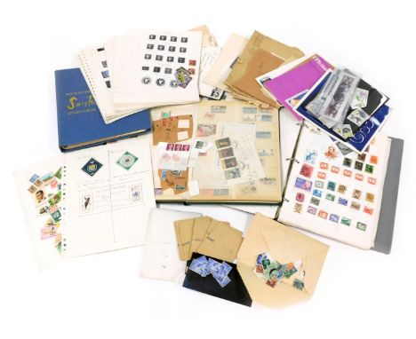 Philately. World commemoratives and definitives, in three albums, together with loose sheets, envelopes with stamps, etc. (a 