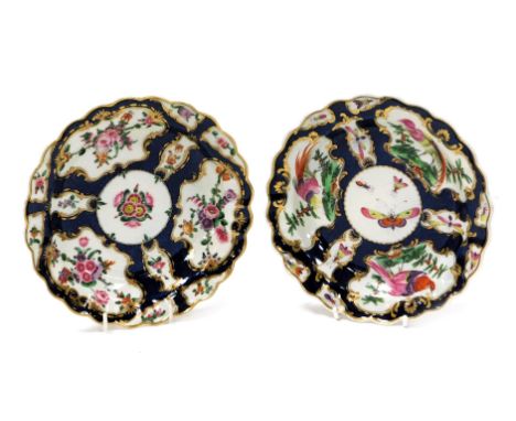 Two Worcester first period porcelain dishes, of circular fluted form, one decorated with reserves of exotic birds and insects