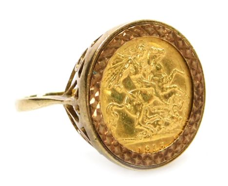 A George V gold half sovereign 1915, in a 9ct gold ring mount, size U, 8.3g. 