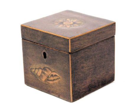 A George III mahogany tea caddy, of square section, decorated to the hinged lid with a floral patera, the front with inlaid e