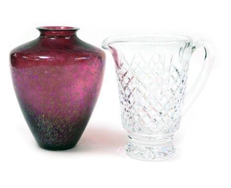 A Royal Brierley Studio red iridescent glass vase, etched mark, 19.5cm high, together with a Waterford crystal water jug, 19c