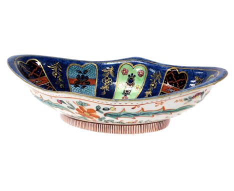 An early 19thC Miles Mason ironstone dessert dish, blue printed and clobbered with a chinoiserie design of flowers and scroll