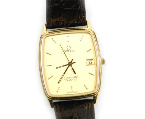 An Omega gentleman's Seamaster wristwatch, oblong dial with gilt batons, centre seconds, date aperture, quartz movement, gold