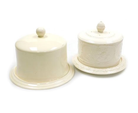 Two circular cheese dishes with covers, One Masons ironstone diameter 31cm the other unmarked with a 28.5cm diameter.