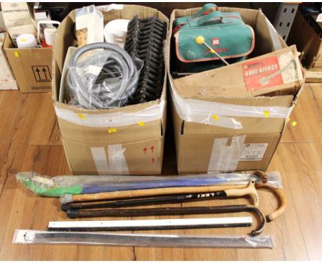 Two boxes of tools and car care equipment and bundle of walking sticks 