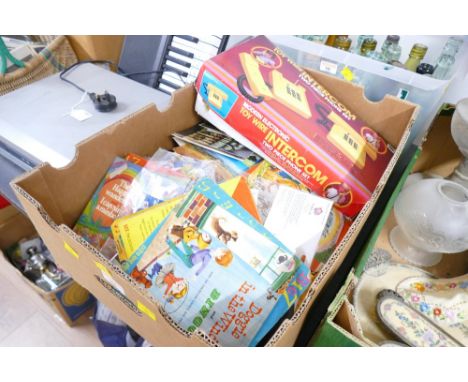 Box of postcards, stamps, vintage photographs, children's vinyl singles and vintage toy telephone 