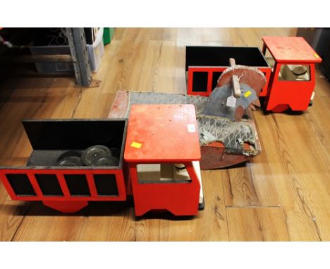 Two vintage wooden toy trucks and vintage wooden rocking ride on cock