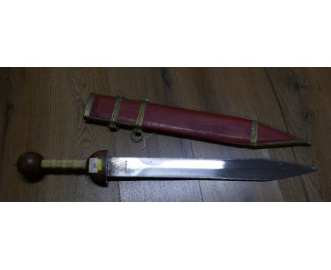 Roman Gladius type replica sword with scabbard  This bladed lot is not for sale to people under the age of 18. By bidding on 