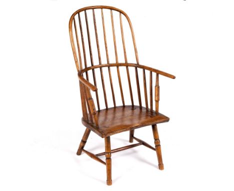 A Windsor type stick back chair with elm seat, possibly cut down