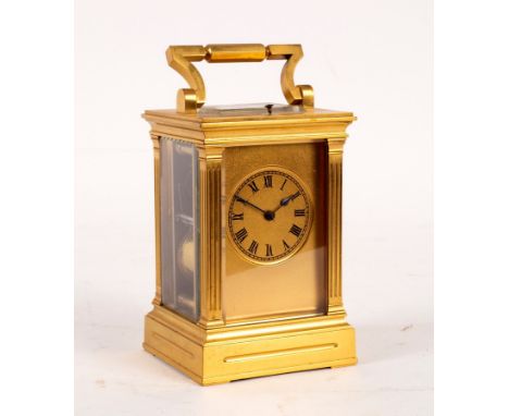 A gilt brass hour-repeat carriage clock with fluted columns to the sides, 19cm high CONDITION REPORT: 756 - General condition